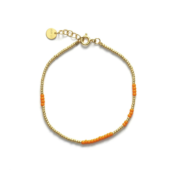 ANNI LU Asym armbånd - tangerine orange perler